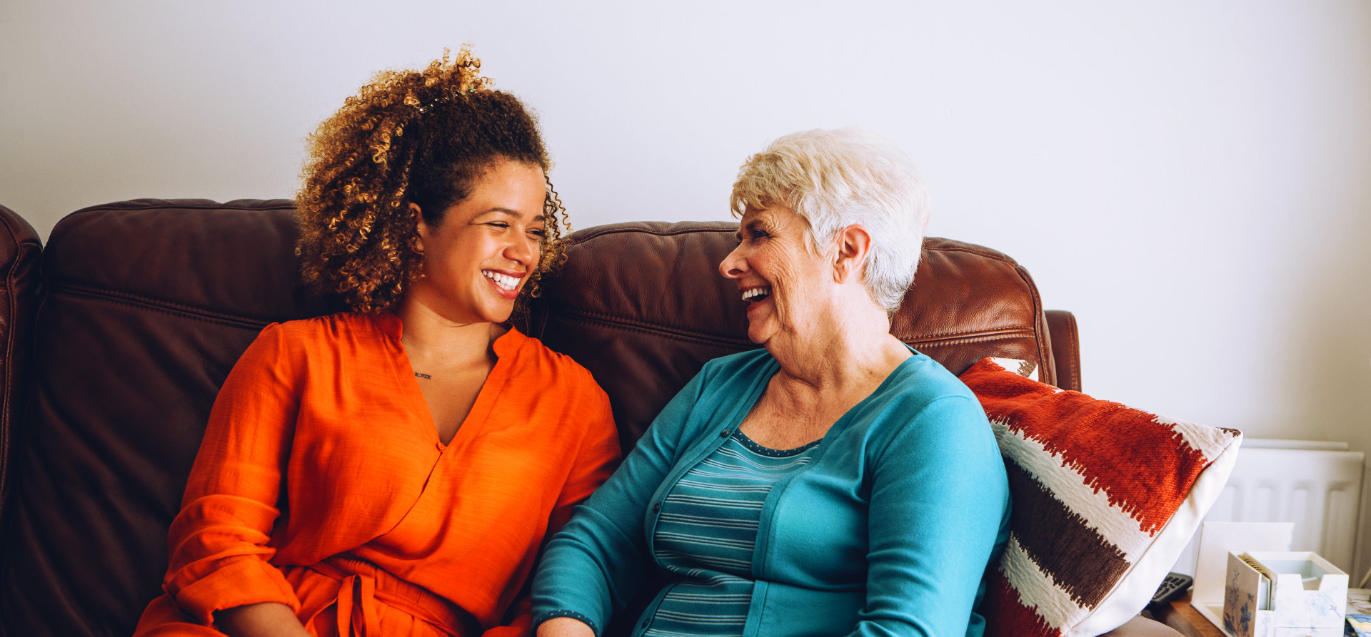 woman and old woman smilling